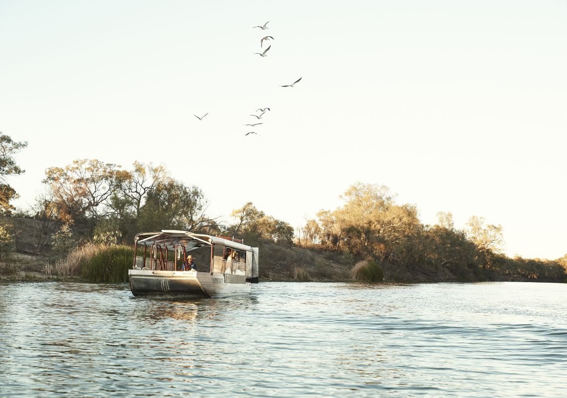 The River Lady vessel cruising along the Darling River in Menindee, Outback NSW