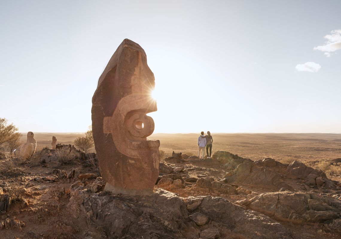 Couple enjoying a walk through The Living Desert and Sculptures attraction in Broken Hill, Outback NSW