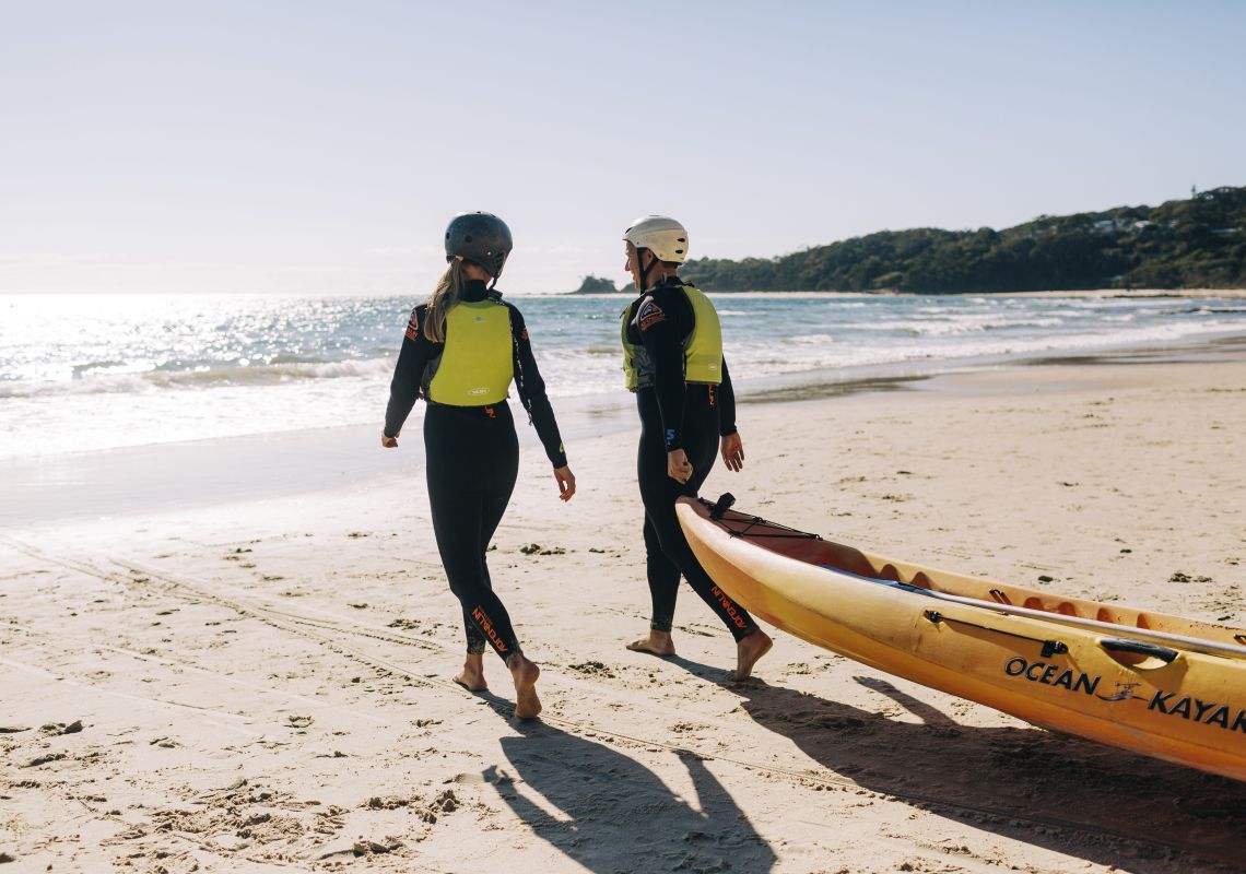 Couple preparing for a tour with Go Sea Kayak, Byron Bay