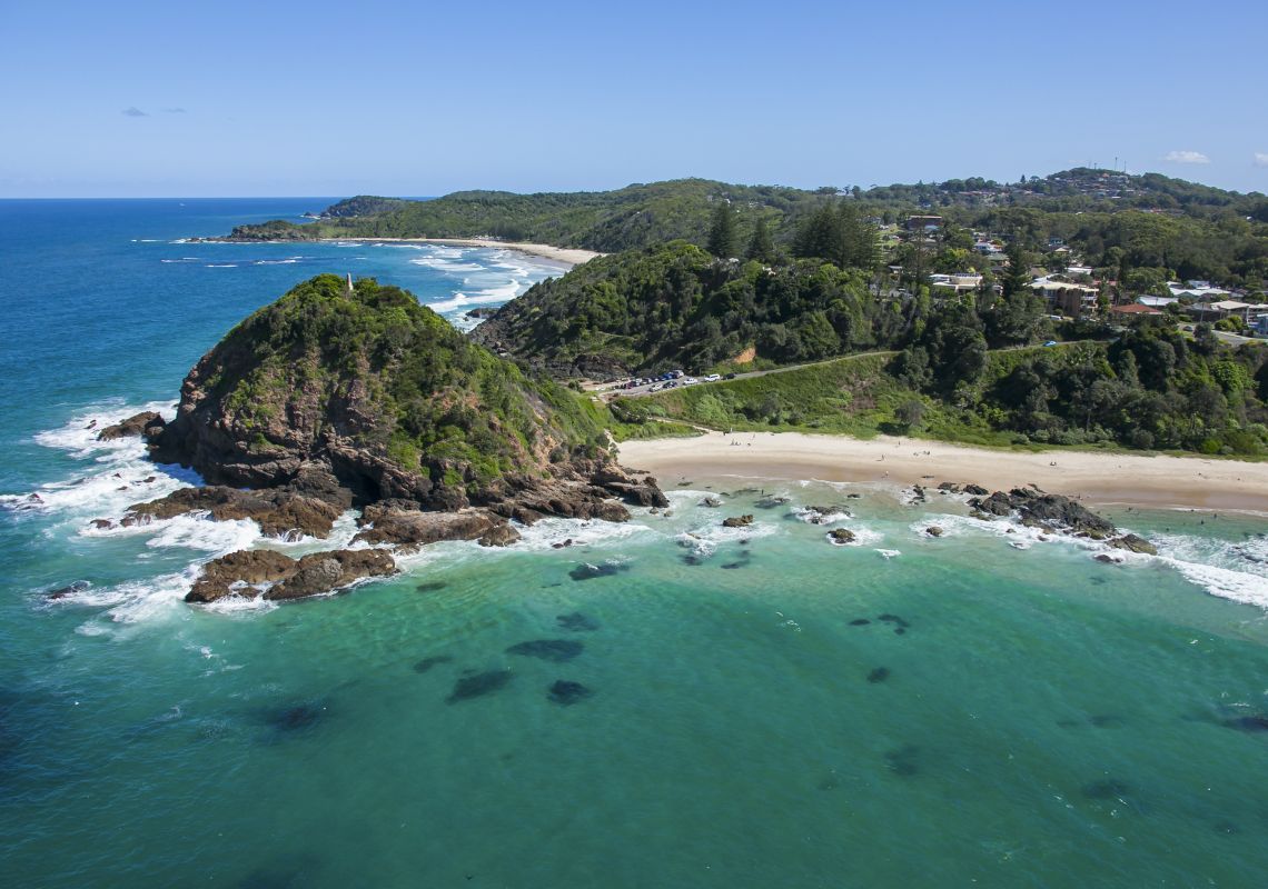 Aerial of Nobby Head along with Nobby Beach, situated on Port Macquarie's coastline.