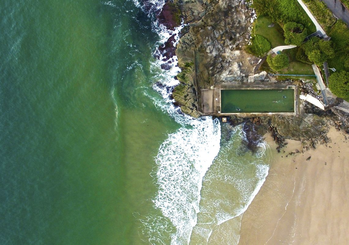 Aerial overlooking Yamba Ocean Pool in Yamba, Clarence Valley