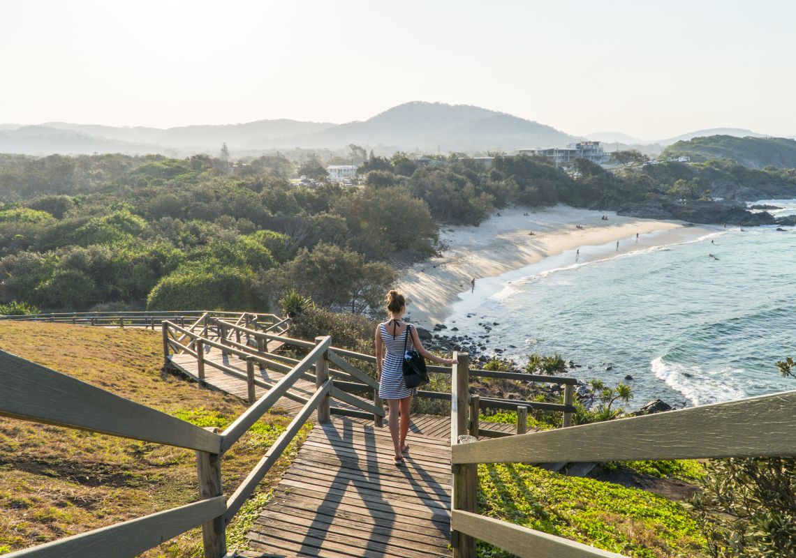 Woman enjoying the scenic view of Cabarita Beach from Norries Head, Northern Rivers