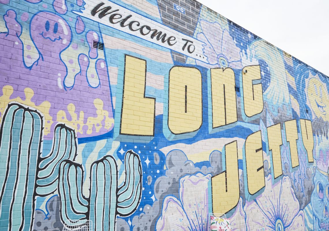 The Welcome to Long Jetty mural painted by artist Brent Smith on the Central Coast