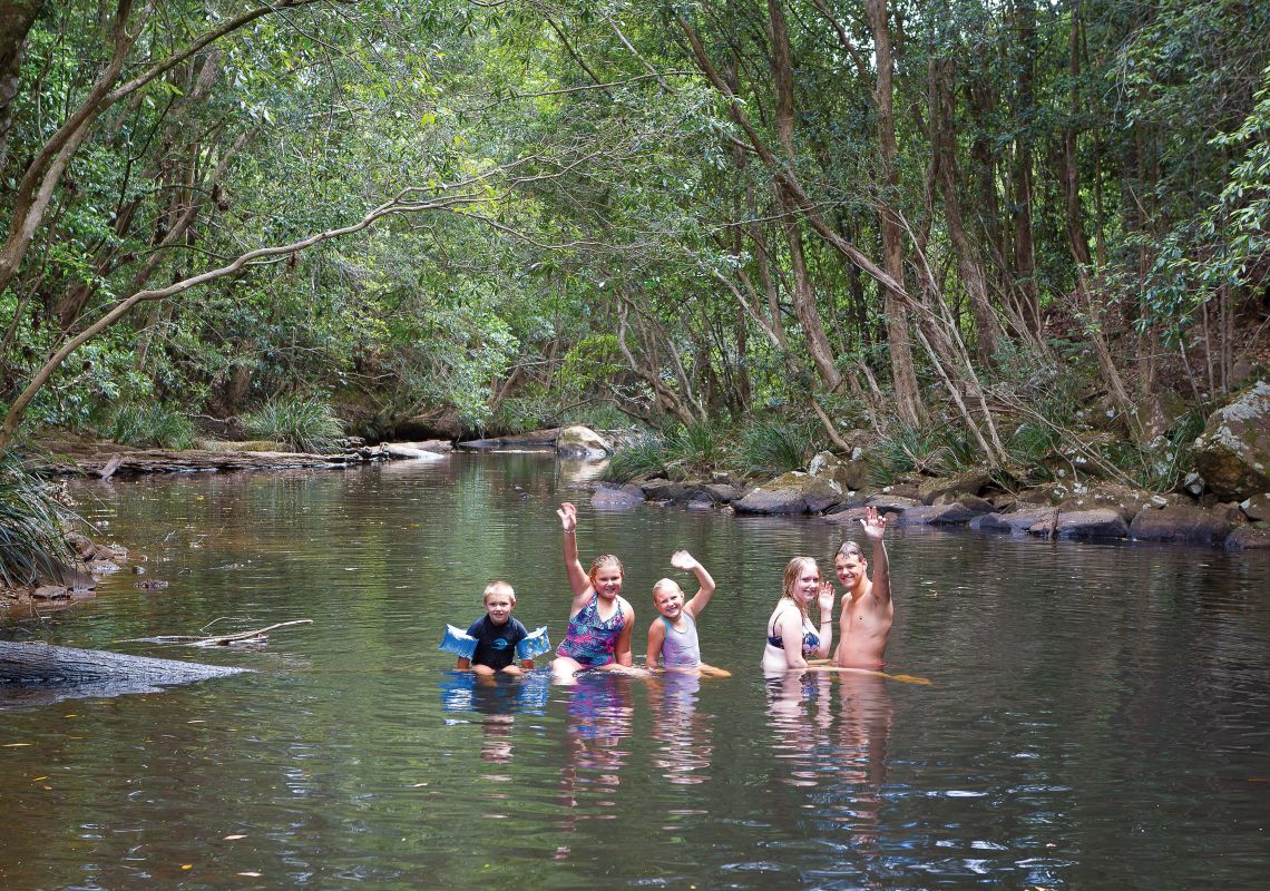 Swimmers in Upsalls Creek, Swans Crossing in Kerewong State Forest, Port Macquarie