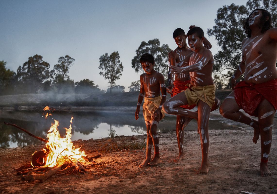 Males from the Barkindji nation dancing besides the Darling River, Wilcannia, Outback NSW