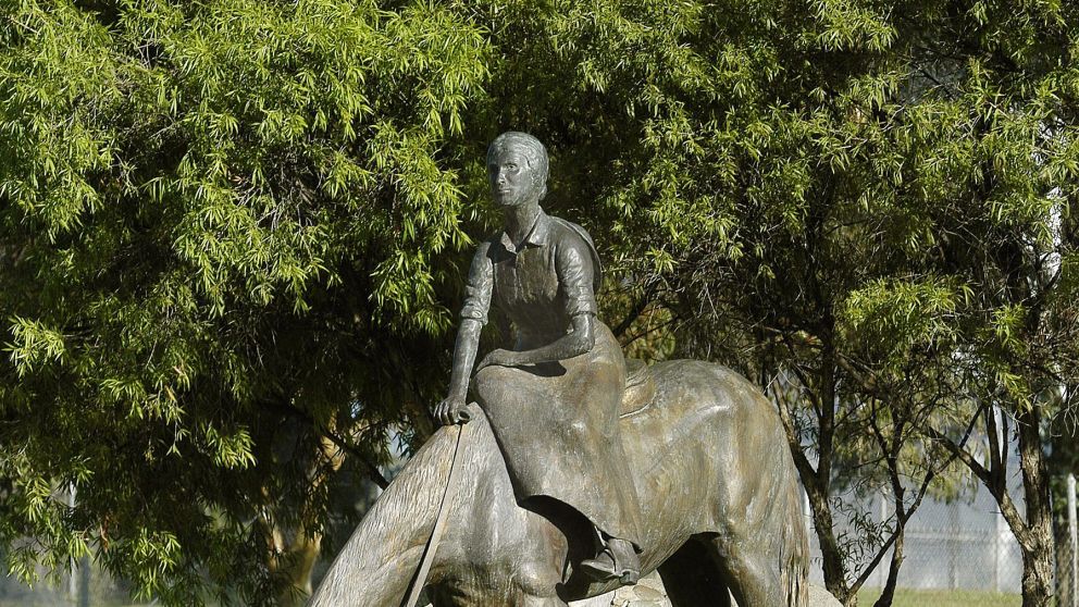 A memorial statue of Dorothea Mackellar on a horse, in Gunnedah