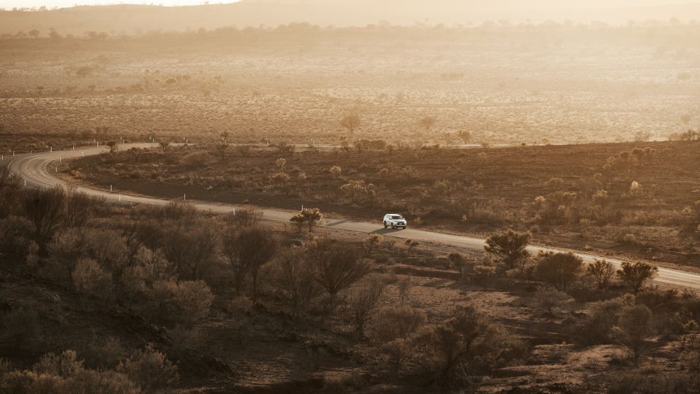 Car driving through the Outback near Broken Hill