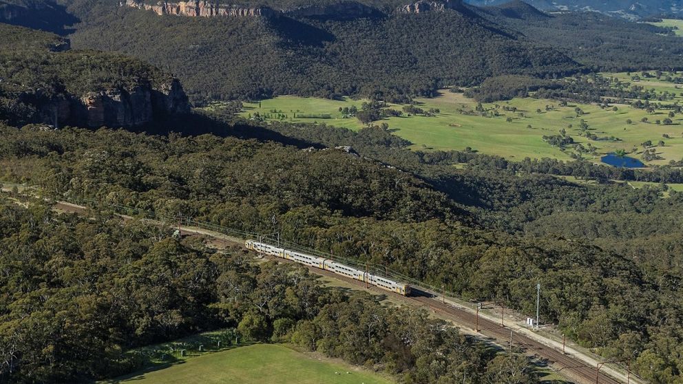 Train passing through Mount Victoria with scenic views of the World-Heritage listed Blue Mountains National Park