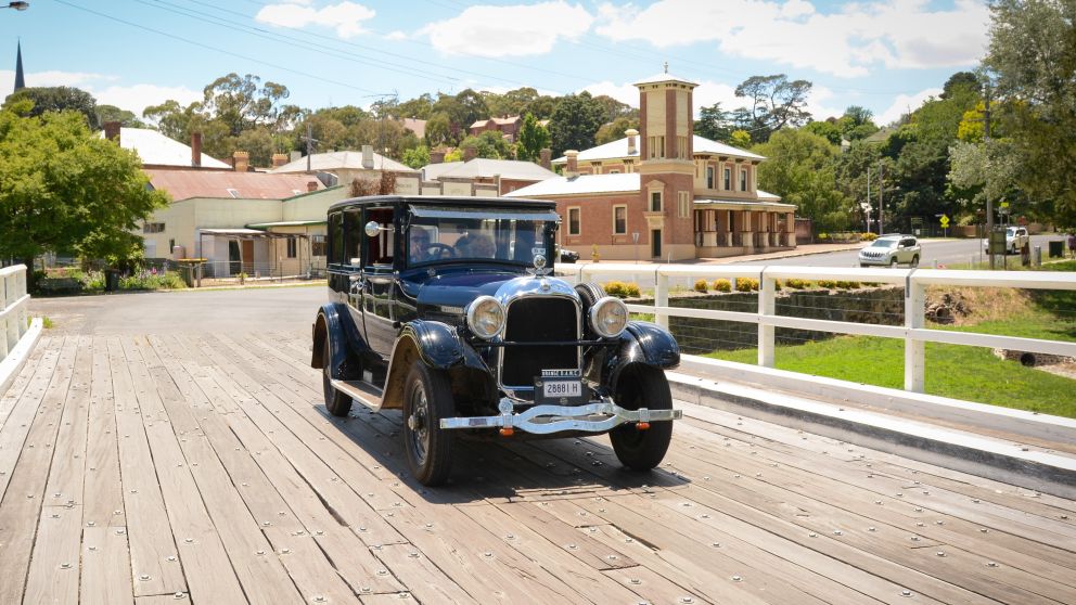 Car driving by the Court House Museum, Carcoar