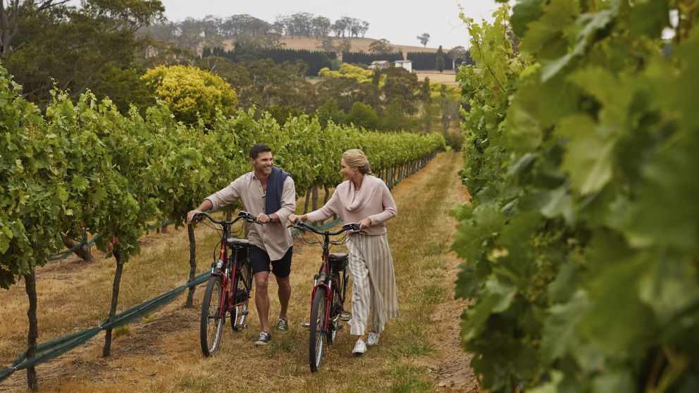 Couple enjoying a romantic getaway at Centennial Vineyards in Bowral, Country NSW