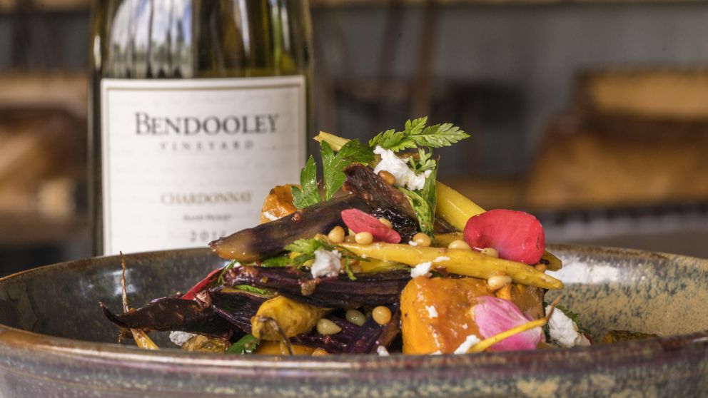 Salad and wine available at Bendooley Estate, Berrima in the Southern Highlands