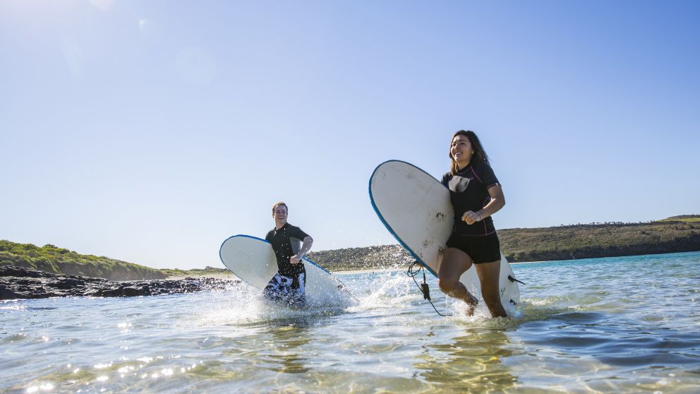 Surfing at Killalea Beach - Shell Cove
