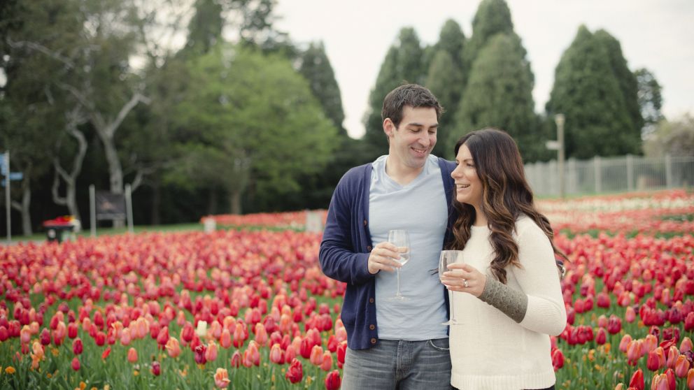 Couple enjoying flowers blooming at Floriade, Canberra