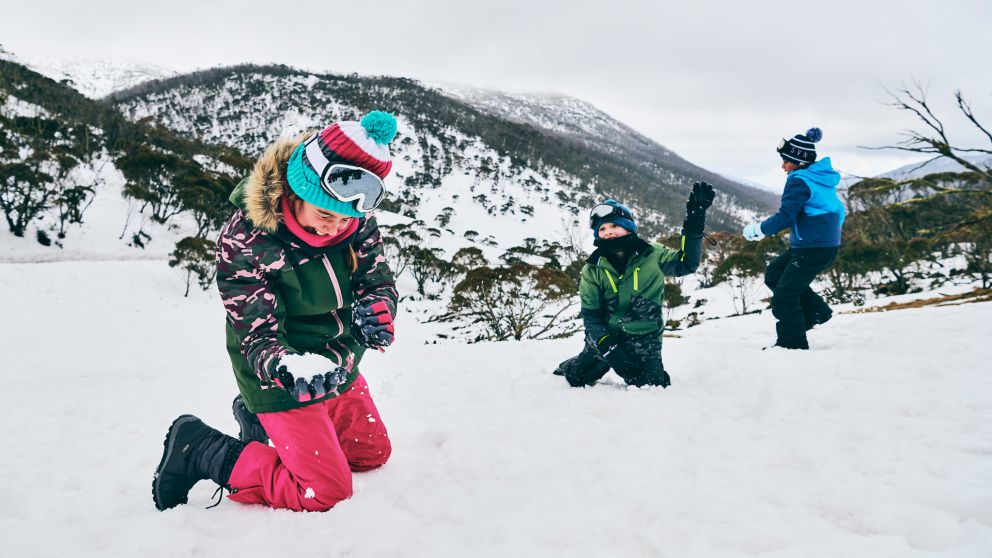 Children enjoying a fun day in the snow at Thredbo, Snowy Mountains