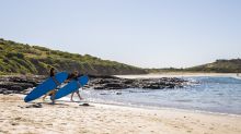 Surfers heading to beach, Killalea Beach - The Farm, Shell Cove