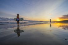 Students at Surf Camp, Gerroa watching the sun set after a day of surfing