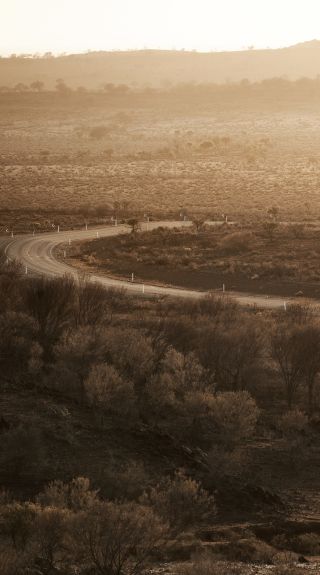 Car driving through the Outback near Broken Hill