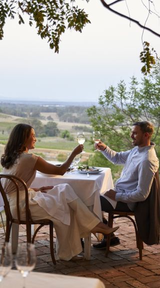 Couple enjoying food and drink at Bistro Molines in Mount View, Hunter Valley
