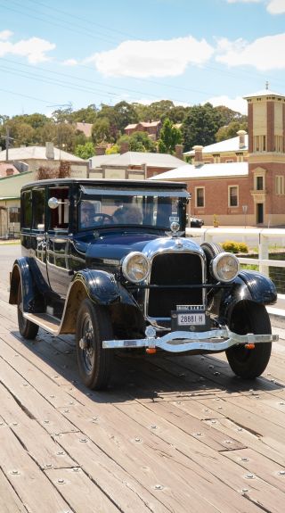 An old car, Court House Museum in the background, Carcoar in Orange Area, Country NSW