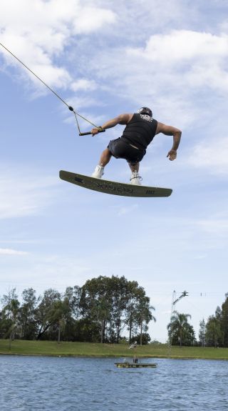 Man enjoying a wake boarding experience at Cables Wake Park, Penrith