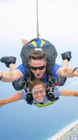 Woman enjoying a skydiving experience with Skydive, Wollongong