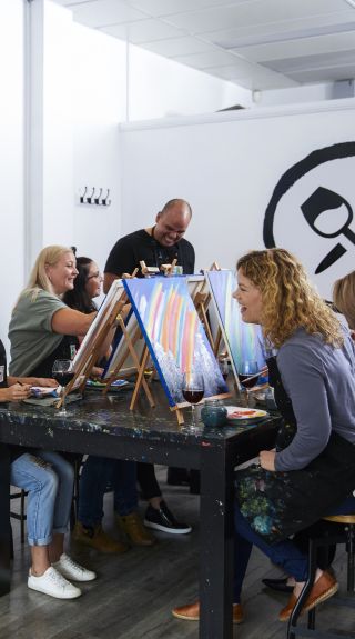 Attendees enjoying a painting class at Pinot & Picasso in Penrith, Sydney