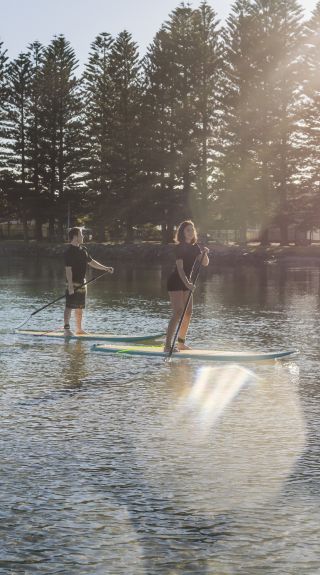 Stand-up paddleboarding on Lake Illawarra in Shellharbour