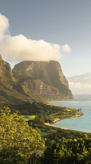 Scenic coastal views across Lord Howe Island to Mount Lidgbird and Mount Gower