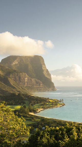 Scenic coastal views across Lord Howe Island to Mount Lidgbird and Mount Gower