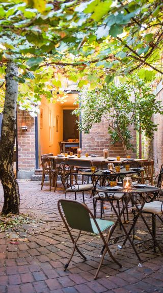 Charming grapevine covered courtyard, Mudgee - Credit: Amber Hooper