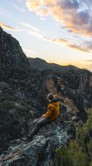 Man watching the sun set in the Warrumbungle National Park
