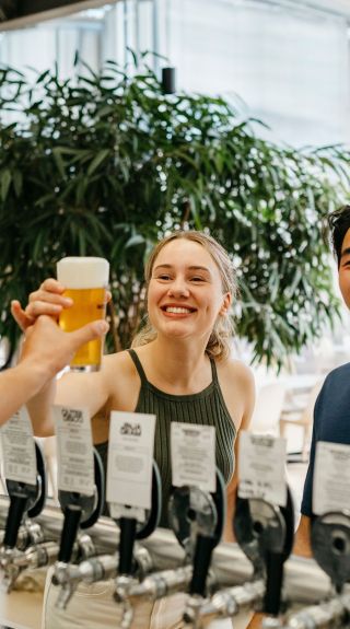 Young people being served beer, Modus Brewing, Newcastle