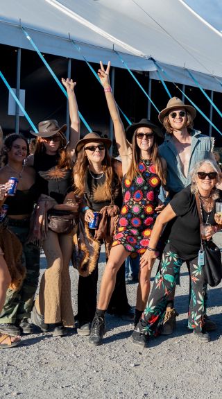 Group of festival goers outside tent, AO Blues Fest - Credit: Alex Hallag