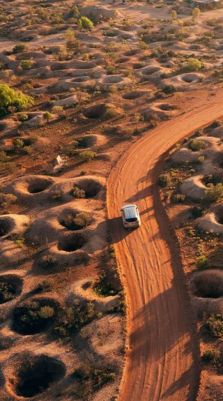 Scenic aerial overlooking a car driving, Scenic Drive, White Cliffs