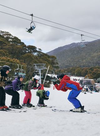 Family learning how to ski with the instructor at Thredbo in the Snowy Mountains