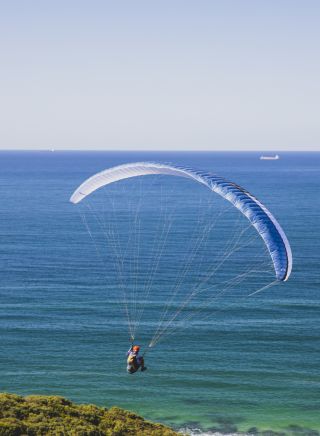 Man enjoying a day of paragliding from Hickson Street Trail, Merewther in Newcastle