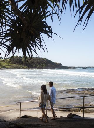 Couple enjoying a day out at Yamba Main Beach, Yamba