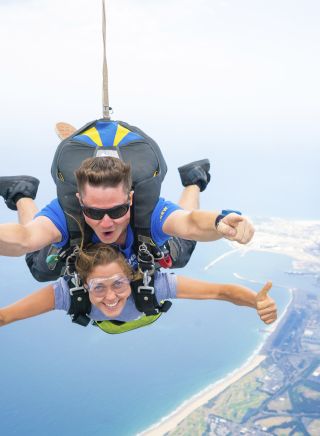Woman enjoying a skydiving experience with Skydive Sydney - Wollongong