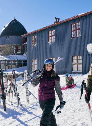 A couple heading out to ski at Charlottes Pass in the Snowy Mountains