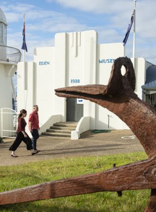Couple enjoying the sights around the Eden Killer Whale Museum in Eden, Sapphire Coast