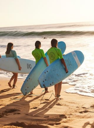 Students enjoying a learn to surf experience with Central Coast Surf Academy, Avoca Beach