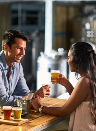 Couple enjoying IronBark Hill Brewhouse, Pokolbin