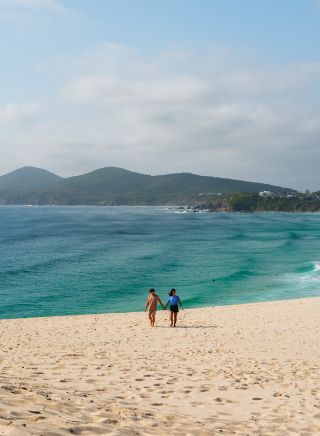 Paar beim Kajakfahren, Jimmys Beach, Hawks Nest