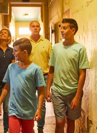 Family visiting and walking through Gaol, Old Dubbo Gaol, Dubbo