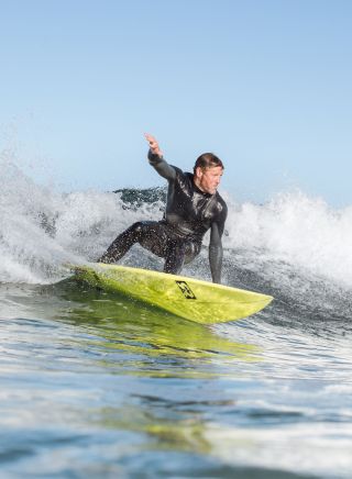 Surfer catching a wave, Surfing, Werri Beach
