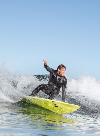 Surfer catching a wave, Surfing, Werri Beach