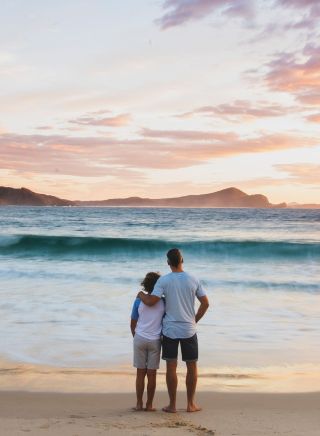 Father and son enjoying a morning walk, Number One Beach, Seal Rocks