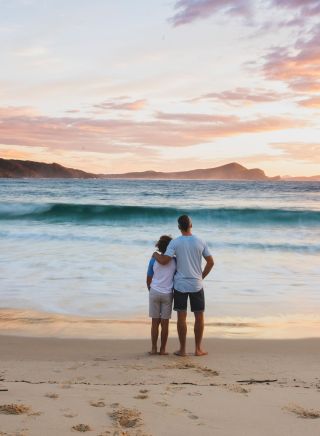 Father and son enjoying a morning walk, Number One Beach, Seal Rocks
