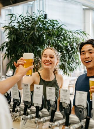 Young people being served beer, Modus Brewing, Newcastle