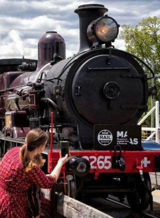 Locomotive steam train arriving into train station, NSW Rail Museum, Thirlmere - Credit: Transport Heritage NSW